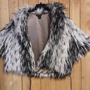 Poncho with insert sleeve